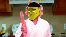 a cartoon of a man in a pink robe holding a pink object