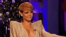 Rihanna Shrug GIF - Rihanna Shrug Lol GIFs