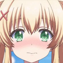 a girl with blonde hair and green eyes has a red cross on her hair