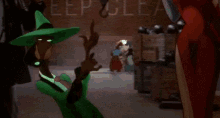 a cartoon character is being attacked by a monster .
