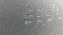 a drawing of a ps2 console and controllers on a gray surface