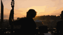 Sunset Playing GIF - Sunset Playing Plucking Guitar GIFs