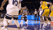 a basketball game is underway and the wolves are playing the lakers