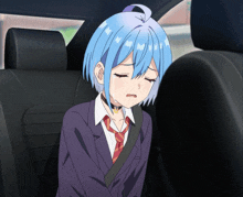 a girl with blue hair is in the back seat of a car
