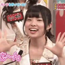 a girl with a name tag that says ' t ' on it