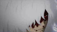 a close up of a person 's face with blood coming out of it