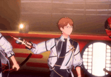 a man in a white and black outfit holds a sword
