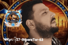 a man with a beard stands in front of a logo for imperator