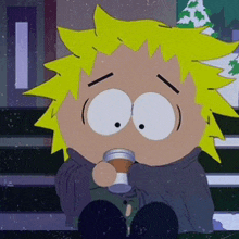 a cartoon character with yellow hair is drinking from a small cup