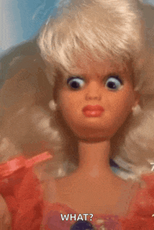 a barbie doll is making a funny face and saying what