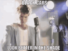 Gino Vannelli Black Cars GIF - Gino Vannelli Black Cars Look Better In The Shade GIFs
