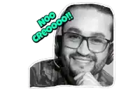 a man wearing glasses and a headset has a sticker on his face that says noo creoooo