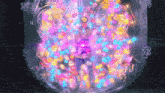 a person standing in a bubble surrounded by a rainbow of lights