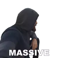 a man wearing a hoodie with the word massive written on it