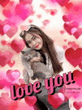 a picture of a woman holding a cat with the words " love you " above her
