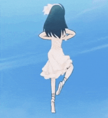 a girl in a white dress is standing on one leg in the water .