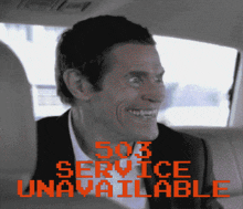 a man sitting in a car with 503 service unavailable written in red