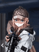 a girl wearing a hat with the letter h on it