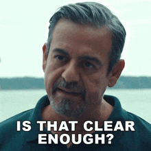 a man with gray hair and a beard is asking is that clear enough