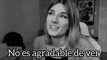 a black and white photo of a woman with the words no es agradable de ver on the bottom
