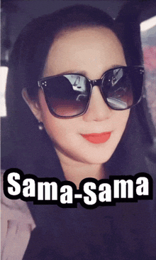 a woman wearing sunglasses has the name sama-sama written below her