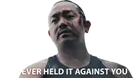 a man with blood on his face has the words " i never held it against you " above him