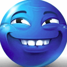 a blue smiley face with white teeth is making a funny face