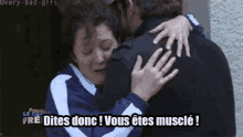a man is hugging a woman who is crying and says dites done !