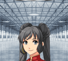 a girl with two buns on her hair is smiling in an empty warehouse