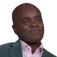 a man wearing a green suit and a pink shirt