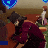 a man in a purple jacket is sitting at a table with a woman sitting on a bar stool behind him .