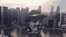 a stuffed animal is flying in the air in front of a city .