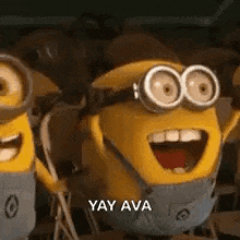 a group of minions are standing next to each other with their arms outstretched .