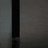 a window with black curtains and white curtains on it