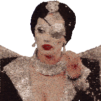 a woman wearing a black and silver costume with a rhinestone eye patch