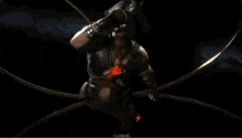 a man in a pirate costume is standing in a dark room .