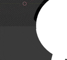 a black and white circle with a red circle in the middle of it .