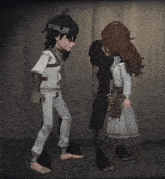 a man and a woman are standing next to each other in a dark room