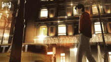 a man in a red sweater is walking down a street in front of a building that says [ as ] on it