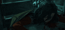 a woman is laying on the floor with blood on the floor
