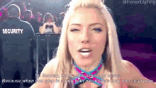 a female wrestler is standing in front of a security guard and says " so sunday bring your pay and classes "
