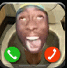 a man is talking on a cell phone while sitting in a toilet seat .