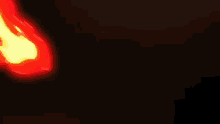 a red and yellow flame on a black background
