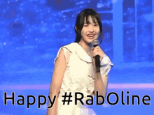 a girl singing into a microphone with the words happy #raboline written below her
