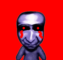 a blue face with red tears on it 's face