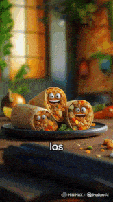three burritos with smiley faces on them are on a plate with the word los on the bottom