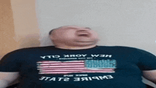 a man is wearing a shirt that says ytd xroy w3m on it