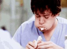 Greys Anatomy George O Malley GIF - Greys Anatomy George O Malley Eating Hot Dogs GIFs
