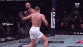 a man in a boxing ring with the word espn on the side