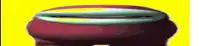 a close up of a red object with a yellow background and a green border .